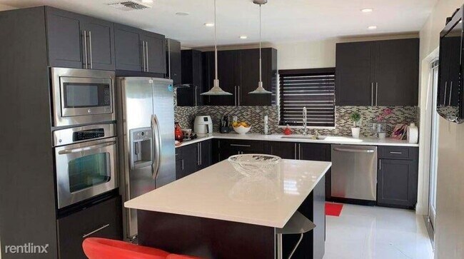 Foto del edificio - 3 br, 2.5 bath House - 4180 NW 7th Ct