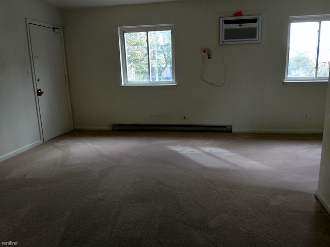 Building Photo - 2 br, 1 bath 4plex - 116 W 36th St Apt C