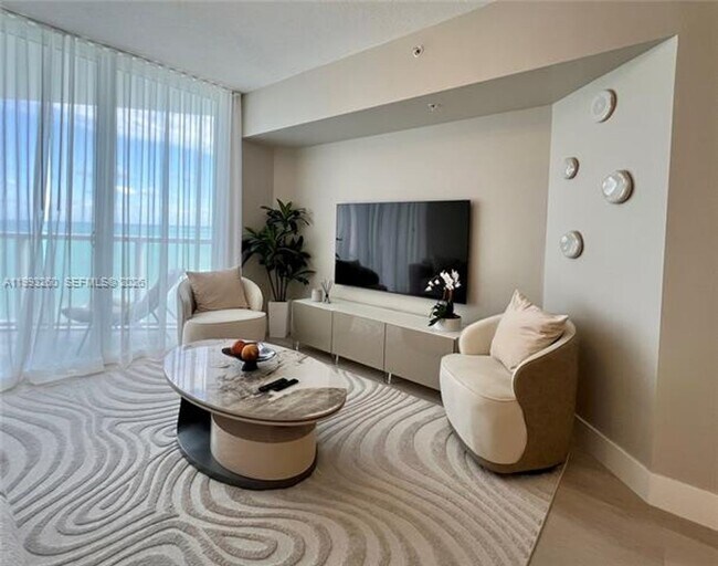 Building Photo - 16699 Collins Ave