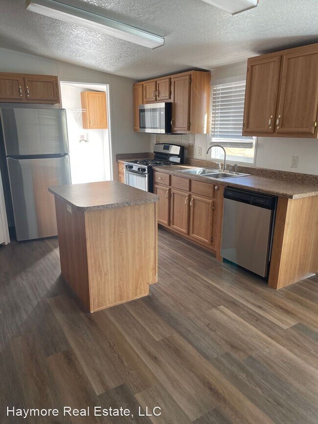 Building Photo - 4 br, 2 bath House - 8511 E Larson Rd