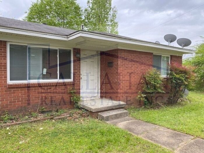 Primary Photo - Updated Park Hill duplex