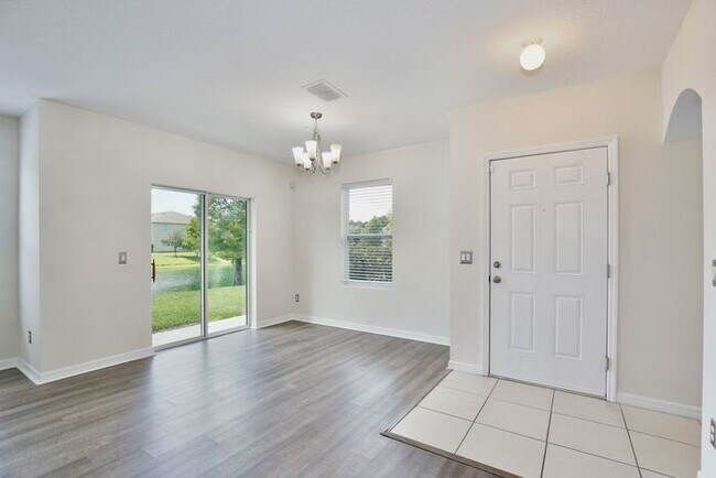 Foto del edificio - Spacious 3/2.5 Townhome with a 2 Car Garage and a Beautiful Pond View in Westwood Condos - Orlando!