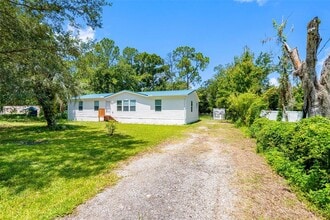 Building Photo - 6847 Woodsman Dr