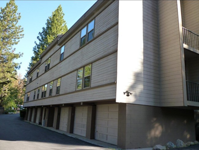 Lower level garages, mid-level commercial, upper apartments - 795 Mays Blvd