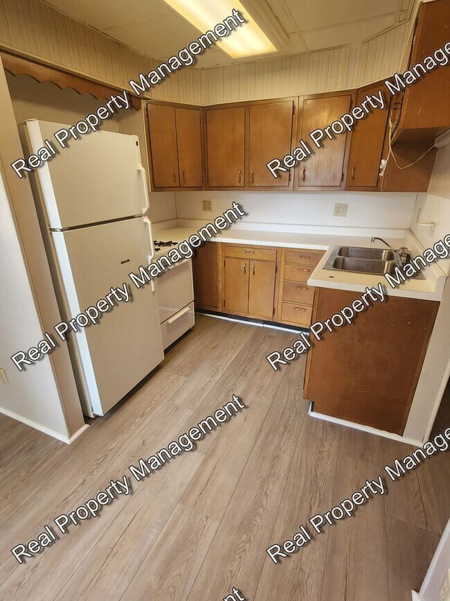 Building Photo - One Bedroom All Utilities Included