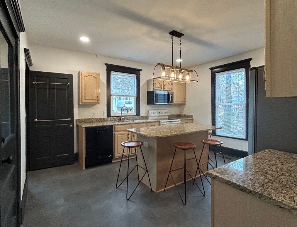 Eat In Kitchen with Loads of cabinet storage - 407 Collicello St