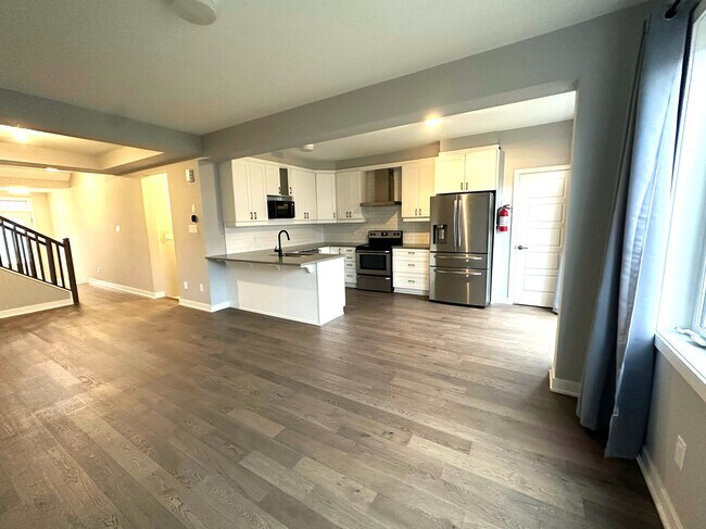 Photo du bâtiment - Contemporary Living at it's Finest! (3 Bed...