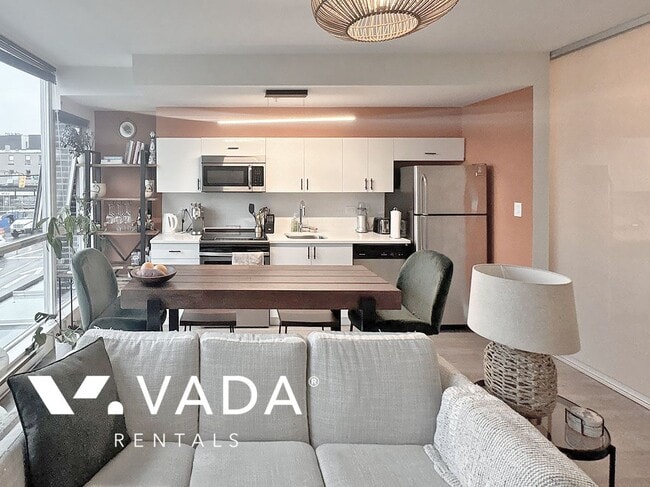 Photo du bâtiment - OnQue Furnished 1 Bedroom Apartment Rental...