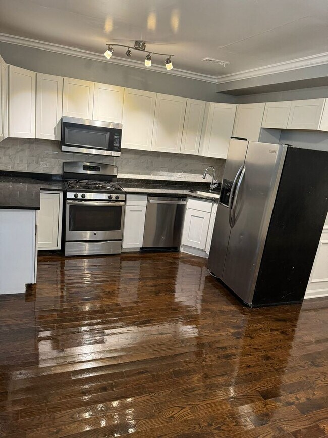 Foto del edificio - 5852 S Prairie Ave