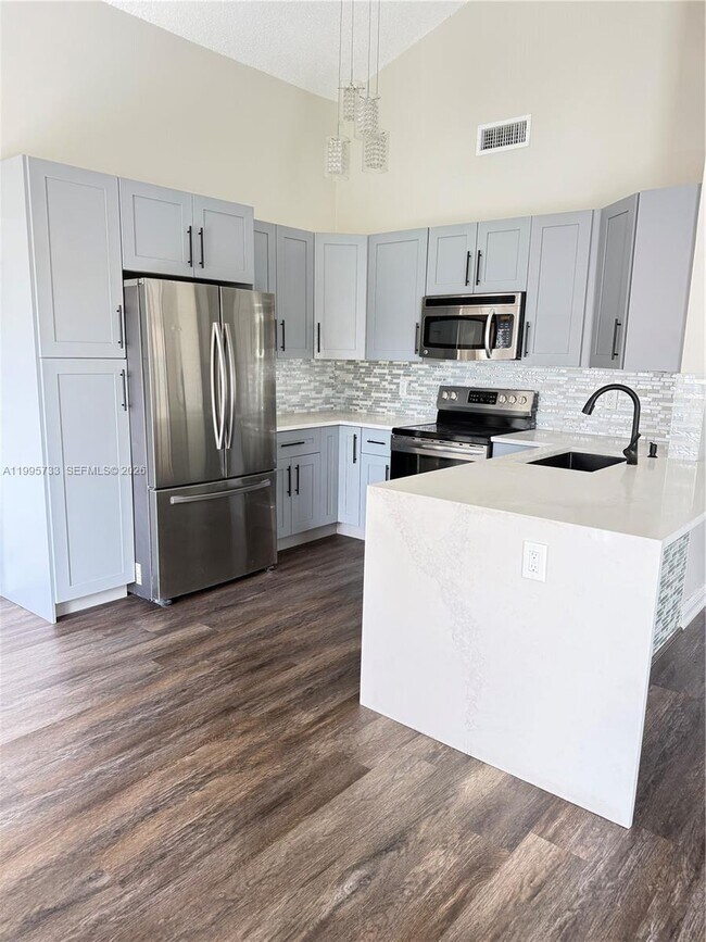 Foto del edificio - 8419 Garden Gate Pl