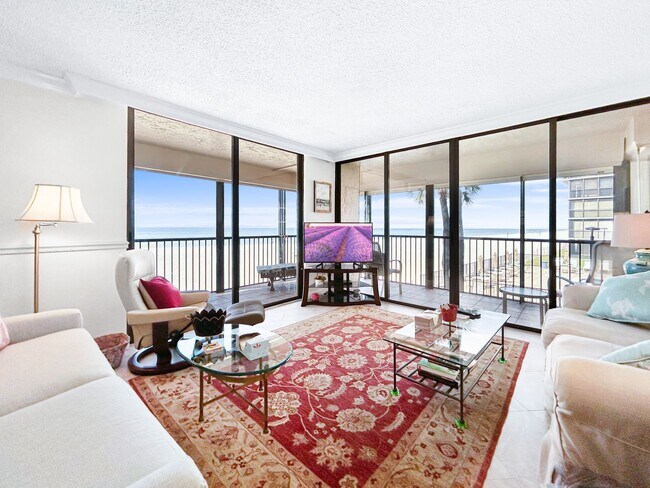 Foto del edificio - Luxurious Corner Unit with Stunning Floor-to-Ceiling Views!