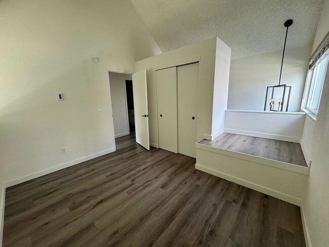 Building Photo - Make this beautiful light filled condo your home!
