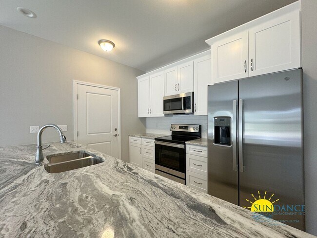 Building Photo - Stunning Centrally Located, a MUST see!