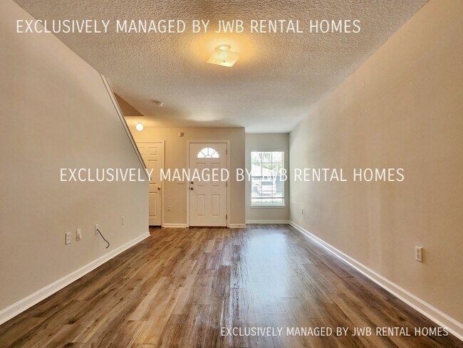 Building Photo - 8467 McGirts Village Ln