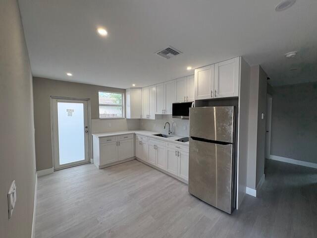 Foto principal - 5580 Honeysuckle Dr