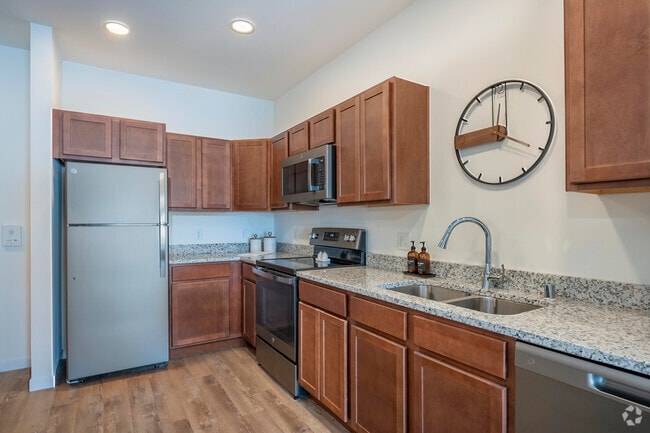 1BR, 1BA - 664SF - Kitchen - Terraces of Windsor Crossing 55+