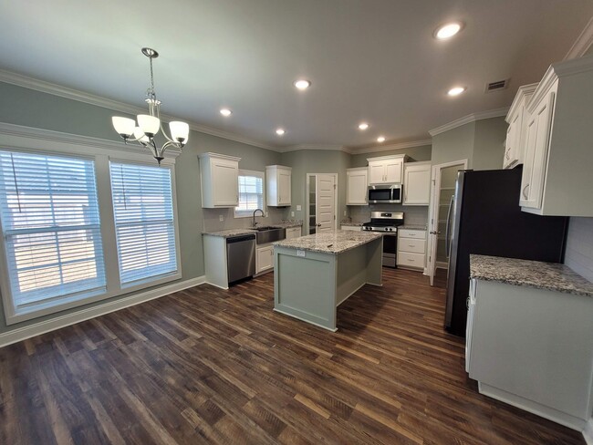 Building Photo - Spacious 4-Bedroom Home with Modern Featur...