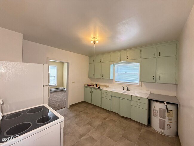 Foto del edificio - Cozy 2-Bedroom Home with Fenced Yard & Rear Parking!