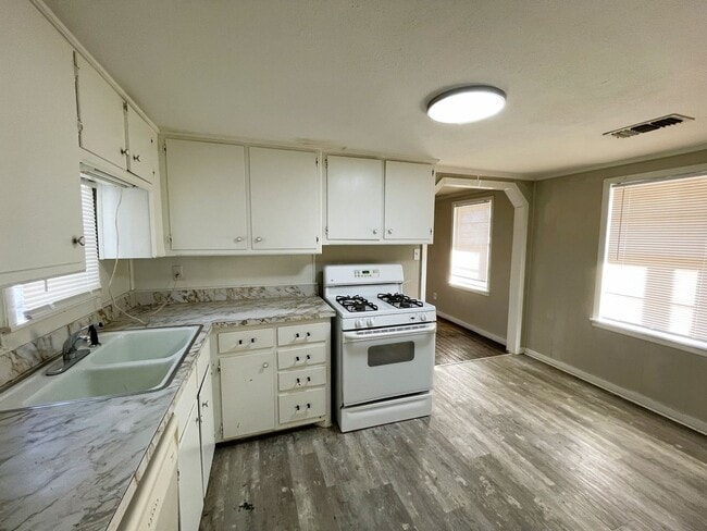 Building Photo - Spacious Home Featuring Two Living Areas I...