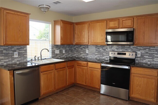 Building Photo - 11735 Rolling Stream Dr
