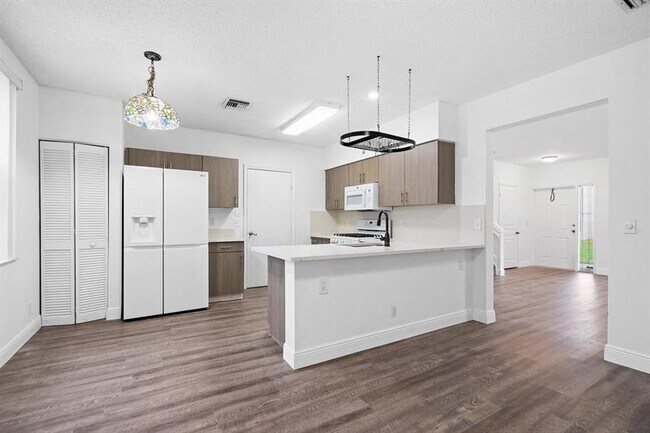 Foto del edificio - 11001 Palm Ridge Ln