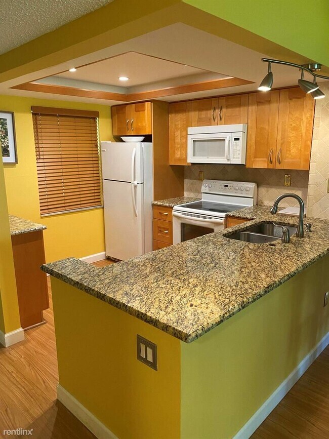 Foto del edificio - 2 br, 2 bath Condo - 9880 Marina Blvd Apt ...