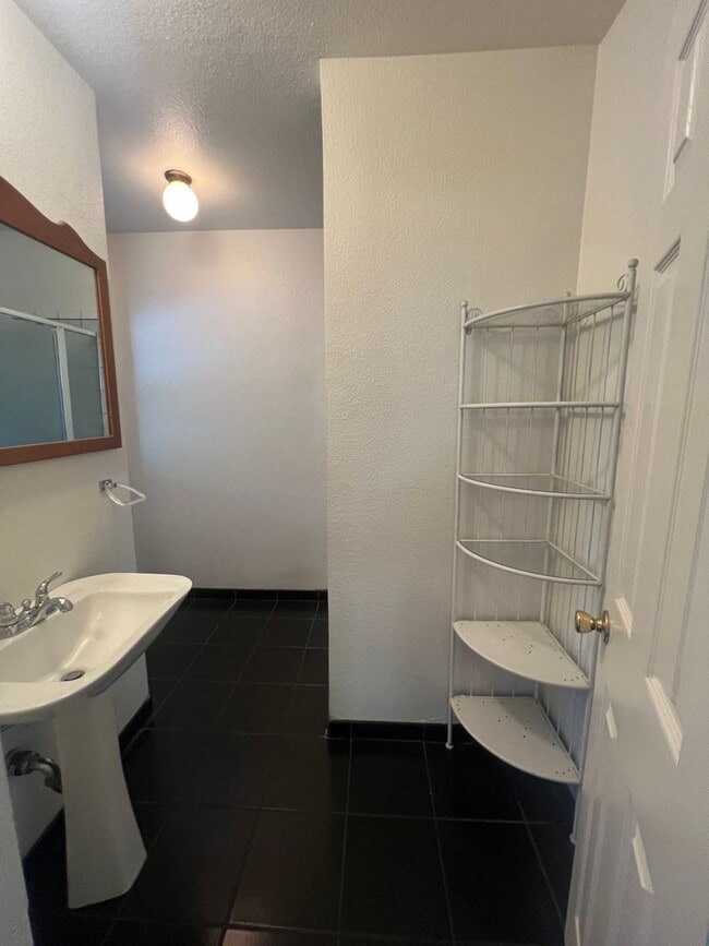 Photo - Charming 3-Bedroom, 2-Bath Tri-Level Home with Unfinished Basement