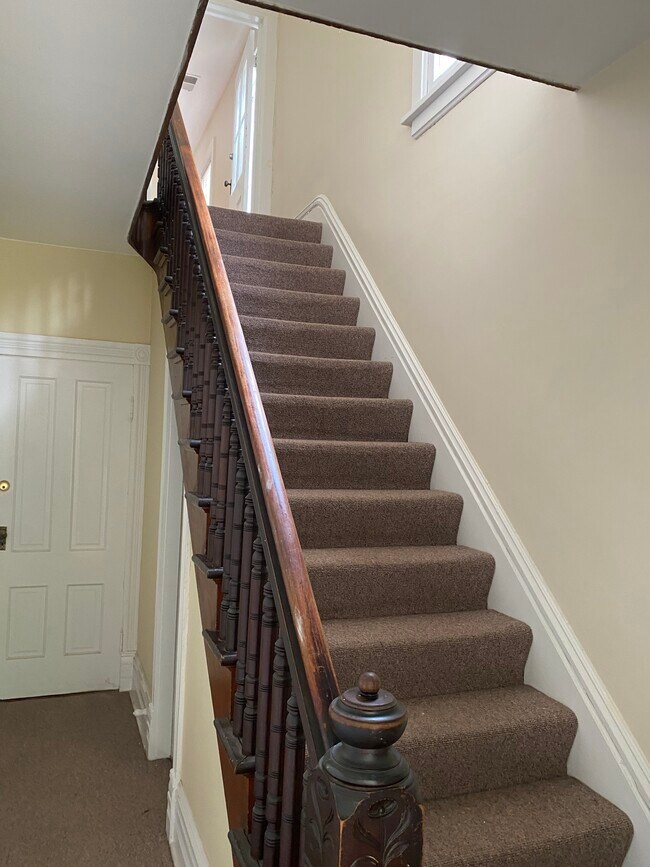 Private stairs to unit - 145 N Larch Ave
