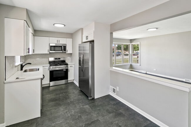 Building Photo - 7704 McVicker Ave