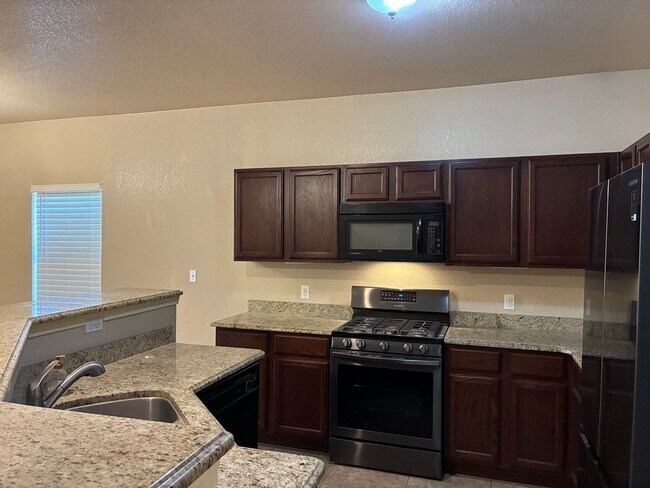 Building Photo - Santa Teresa Beauty 3 Bedrooms plus 2 and ...