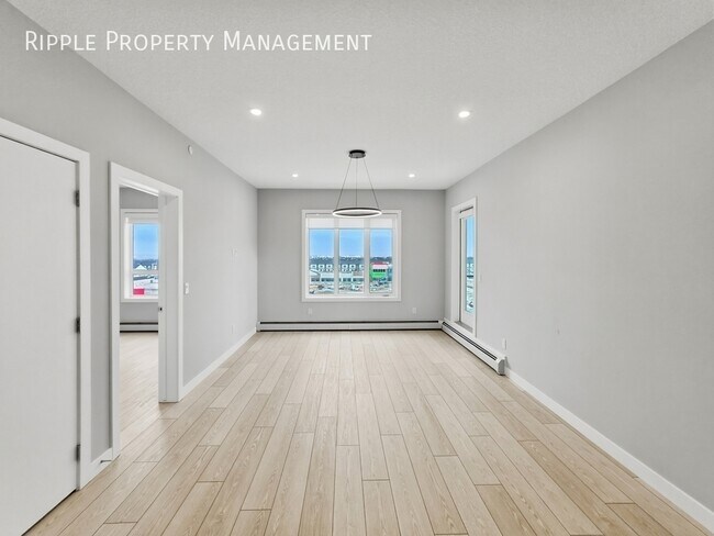 Photo du bâtiment - BRAND NEW 3 BEDS, 2 BATHS CONDO | NEVER LIVED IN & UNDERGROUND PARKING