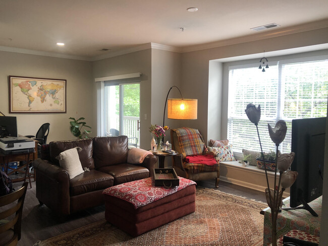 Large living room with adjacent den - 44363 Rock Cove Ter