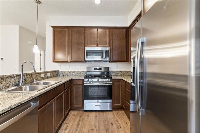 Building Photo - The Sierra - Beautiful 2 Bedroom Luxury Townhome with Loft, 2.5 Bath and 2 Car Garage
