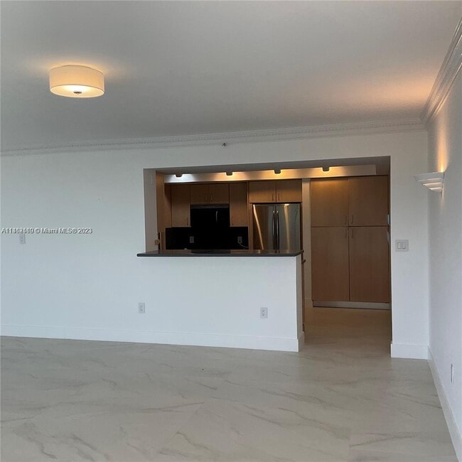Building Photo - 10205 Collins Ave