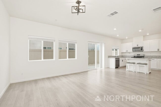 Photo - 3 BR/2.5BA | Newly Renovated Single Family Home | 1-Car Covered Parking | Nice backyard