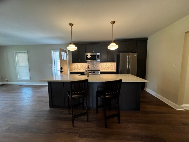 Foto del edificio - 10907 N Woodstock St