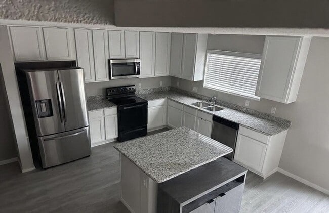 Building Photo - 6317 Bollard Dr