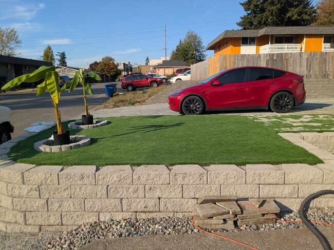 Front lawn artificial grass low maintenance - 24028 25th Ave S