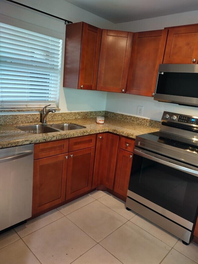 9441 Live Oak Pl Unit 107, Davie, FL 33324 Condo for Rent in Davie