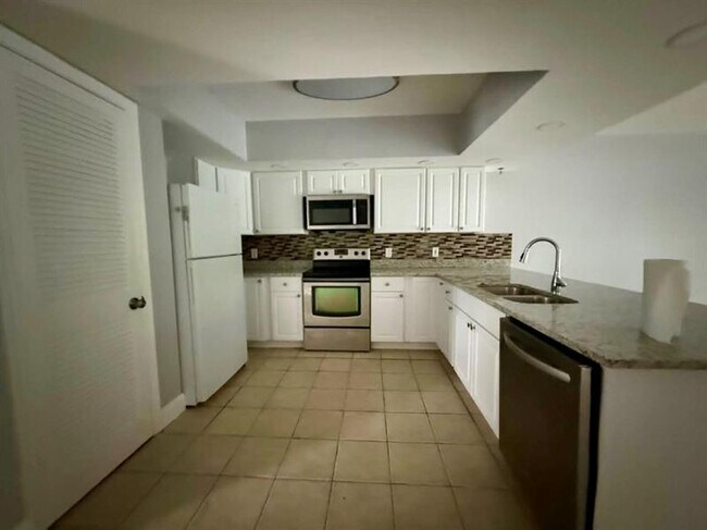 Foto del edificio - 8736 SE Algozzini Pl