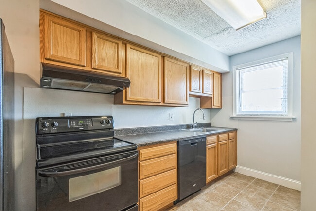 Building Photo - Big Style, Bright Spaces & City Vibes — We...
