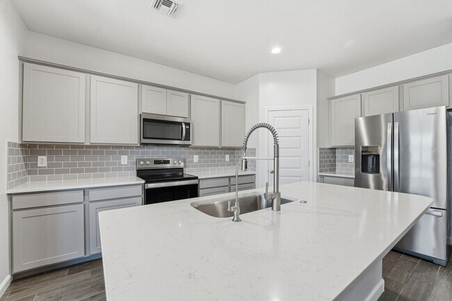 Building Photo - Modern 4-Bedroom Ranch-Style Corner Lot Home - *RENT SPECIAL*