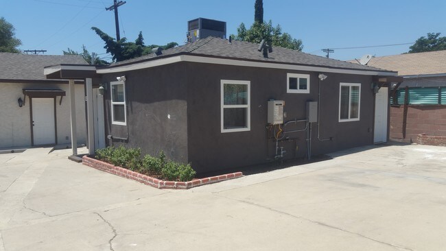 Side of House - 12877 Glenoaks Blvd