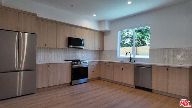 Building Photo - 5248 Auckland Ave