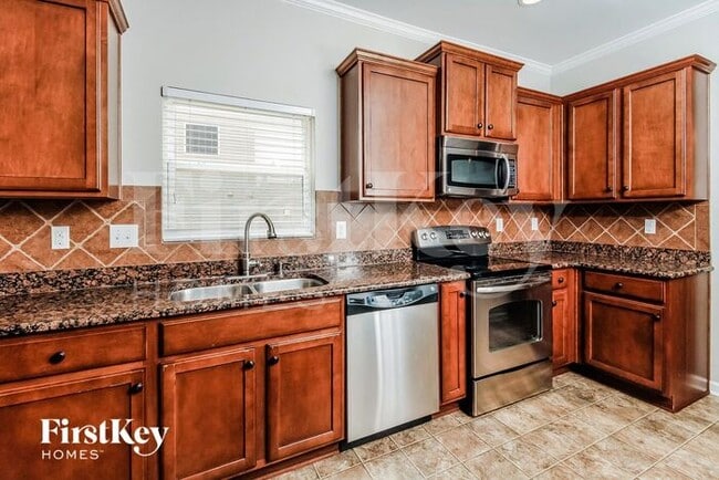 Building Photo - 6608 Championship Dr