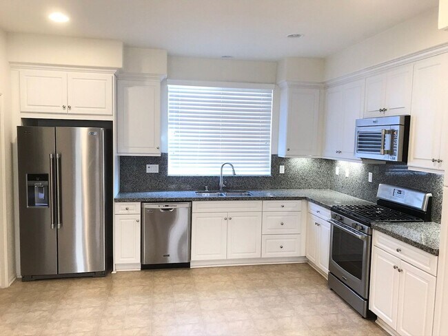 Building Photo - Beautiful 2 Bedroom Condominium with Attached Garage Located in Gated Community of Eastvale