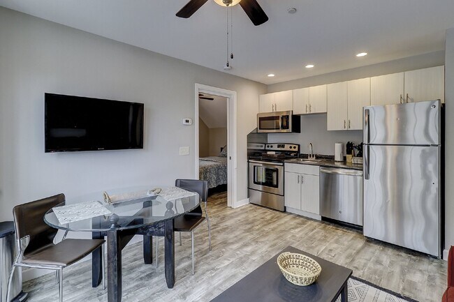 Building Photo - Modern, Furnished (or unfurnished), One Be...