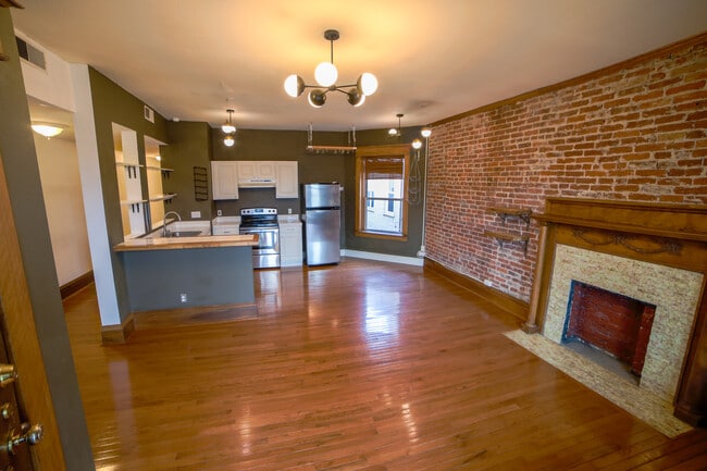 Building Photo - 1210 E Colfax Ave