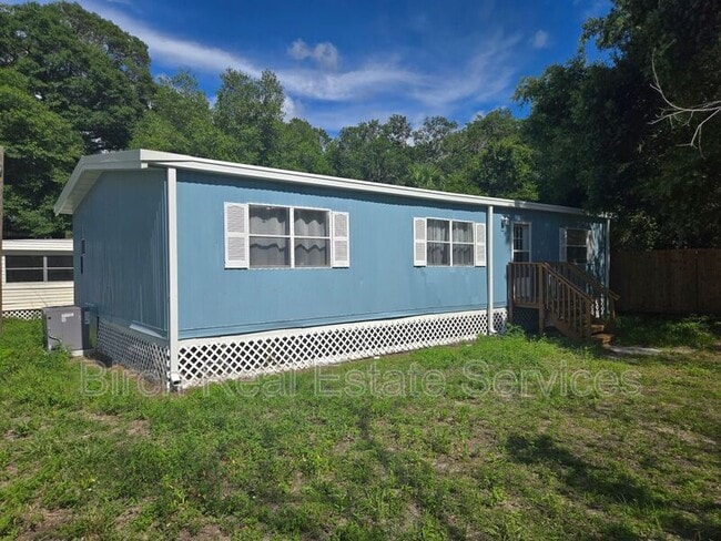 Building Photo - 8628 Adonis Rd