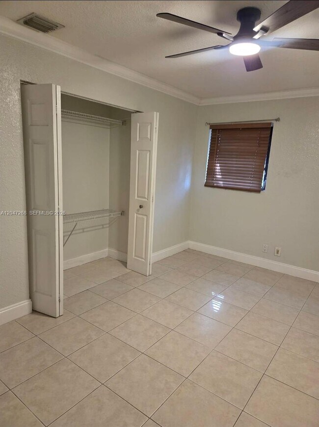 Building Photo - 6118 Royal Palm Blvd